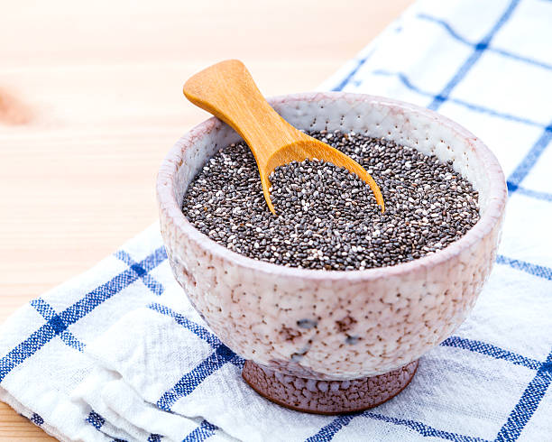 istock Nutritious chia seeds in ceramic bowl on wooden table for 626541094