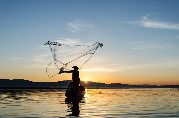 istock Asian fisherman 626542714