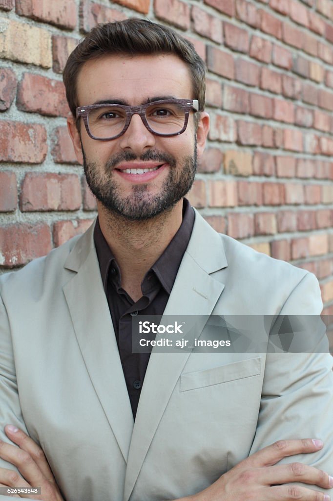 Young successful businessman with glasses Portrait of young successful businessman with glasses outside of the office. 35-39 Years Stock Photo