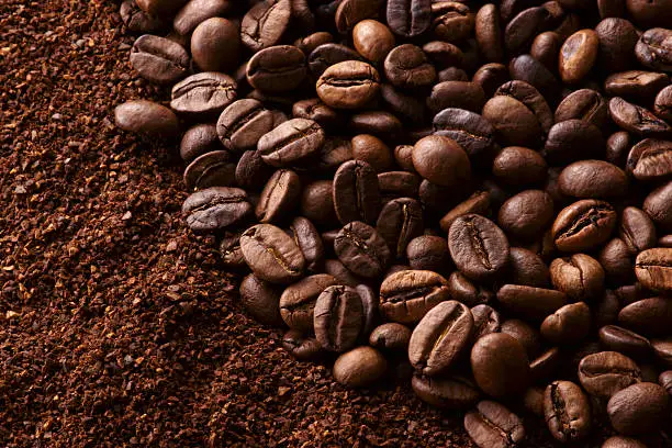 Photo of Coffee beans and ground coffee