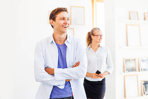 istock Man and woman in one team 626551796