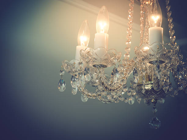 istock Quiet room chandelier,cross processed colors. 626553514