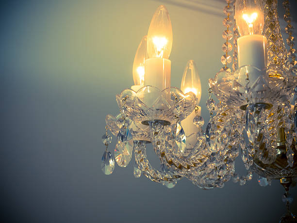 istock Quiet room chandelier,cross processed colors. 626553540