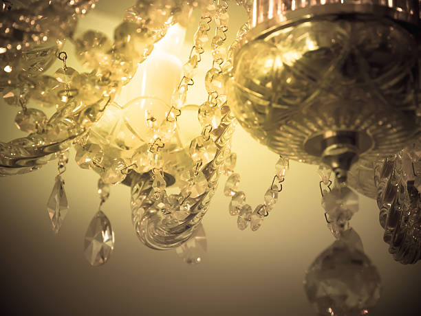 istock Quiet room chandelier,cross processed colors. 626564346