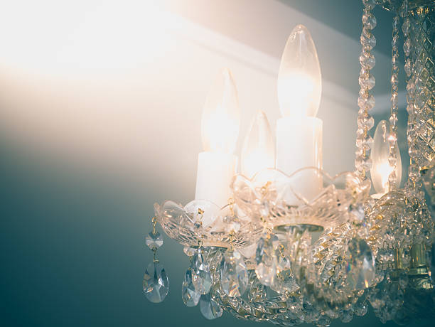istock Quiet room chandelier,cross processed colors. 626564396