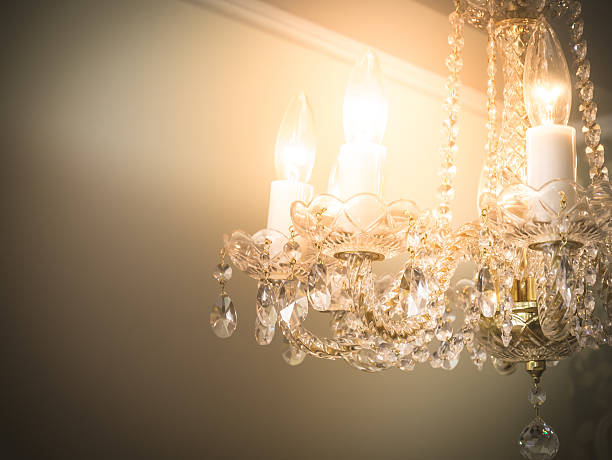 istock Quiet room chandelier,cross processed colors. 626564414
