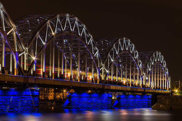istock Movement of train on the railway bridge. Long time exposure 626568094