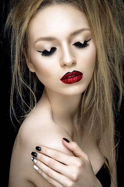 istock Beautiful woman portrait with red lips. 626569546