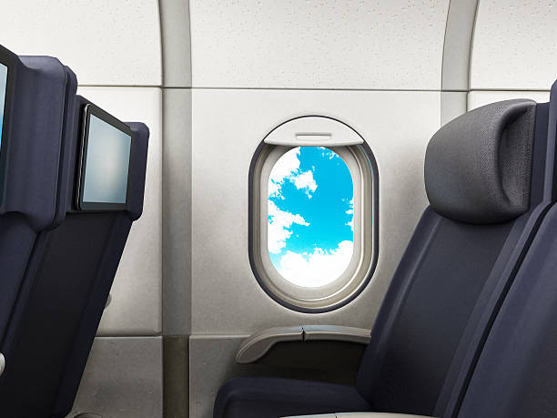 istock Airplane seats and sky view from airplane window 626570078