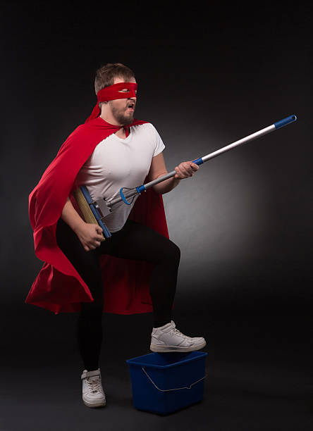 istock Super hero with cleaning equipment 626574860