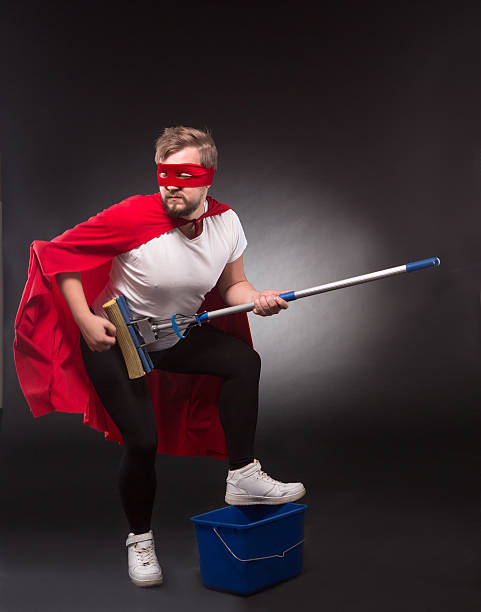 istock Super hero with cleaning equipment 626574902