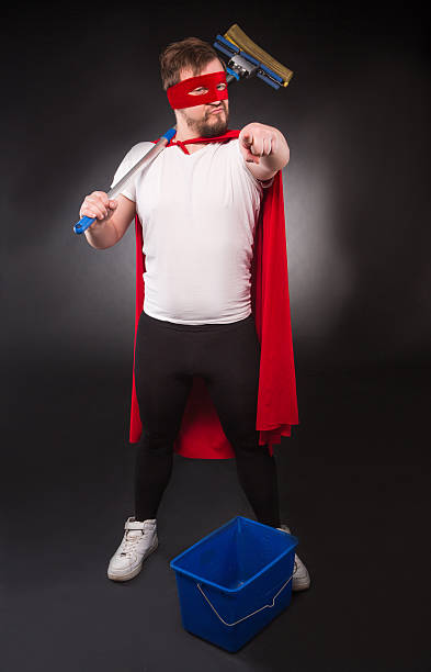istock Super hero with cleaning equipment 626575106