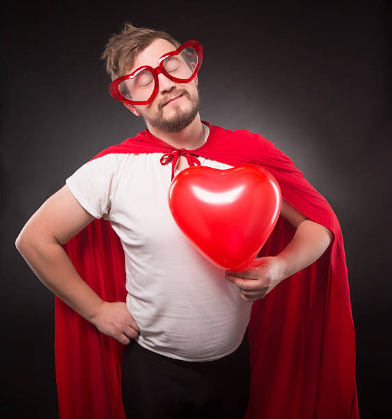 istock Super hero man in love 626576416