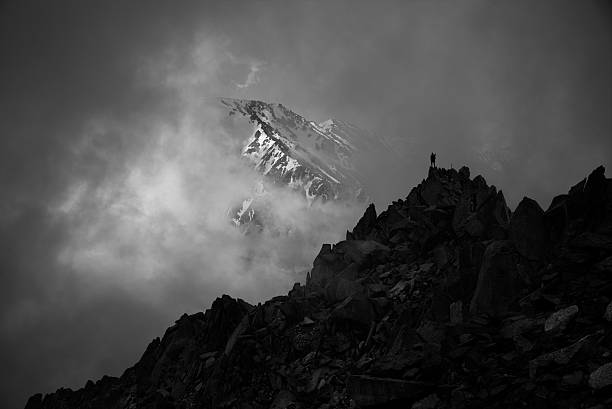 istock Young hiker man stay on top of mountain 626576528