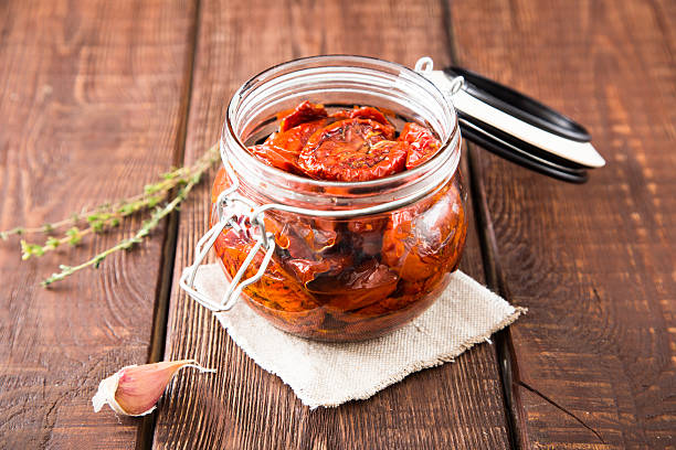 istock Sun dried tomatoes with herbs and sea salt 626576908