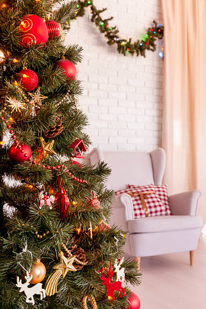 istock Christmas tree in living room 626584158