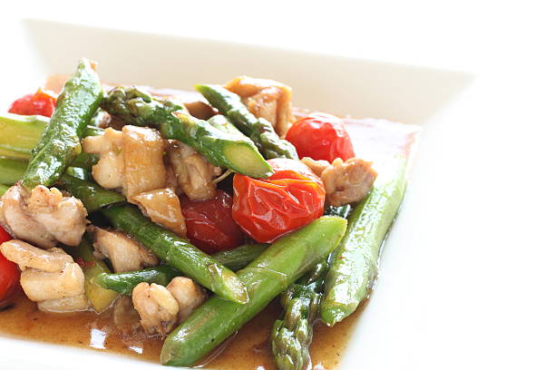 istock Chinese food, chicken and asparagus stir fried 626585320