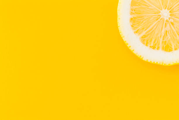 istock Lemon on a yellow background 626585824