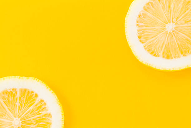 istock Lemon on a yellow background 626585842