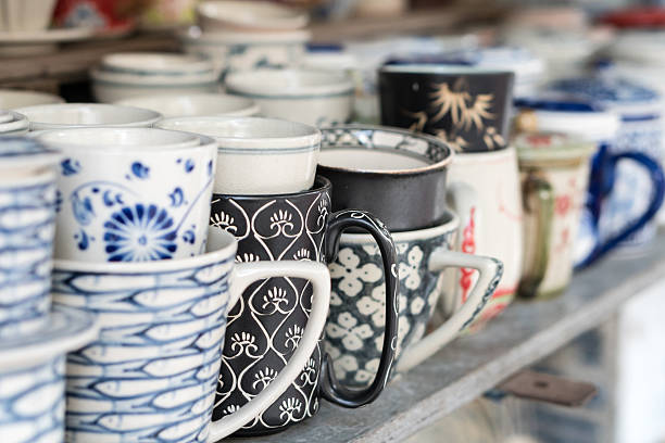 istock Cups and mugs on a shelf 626587636