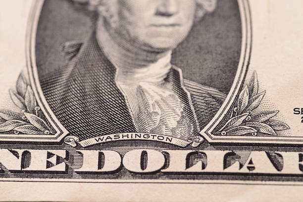 US one dollar, detail view. Macro with selective focus and shallow depth of field.
