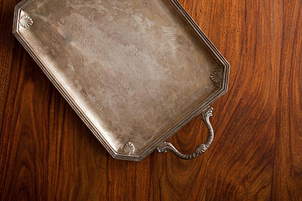 istock retro tray on wooden table 626592230