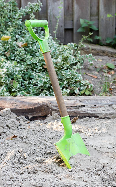 istock Little shovel in the sand 626602440