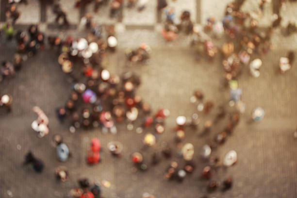 istock Blurred crowd of people. Top view 626604146