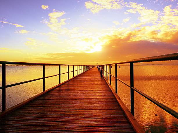istock Morning in harbor. Touristic mole, wet pier above sea 626605872