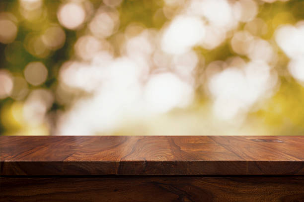Empty top wooden table and autumn background