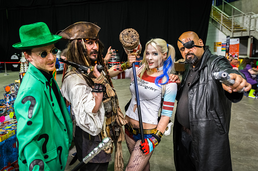 Sheffield, United Kingdom - June 12, 2016: Cosplayers dressed as 'The Riddler', 'Captain Jack Sparrow', 'Harley Quinn' and 'Nick Fury' at the Yorkshire Cosplay Convention at Sheffield Arena