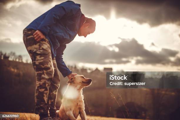 Big Friendship Stock Photo - Download Image Now - Dog, Animal Trainer, Instructor