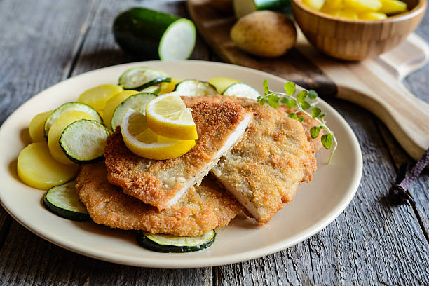 istock Turkey schnitzel with potato and zucchini 626618416