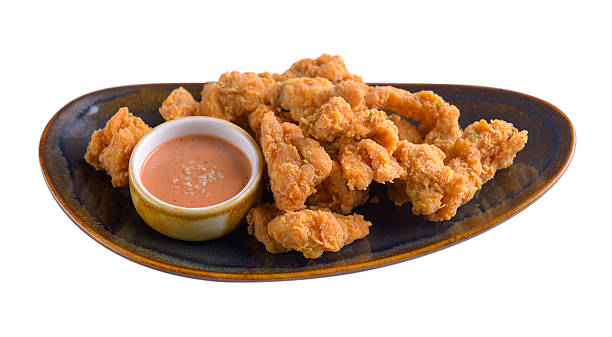 istock Fried chicken with sauce in plate on white background 626622200