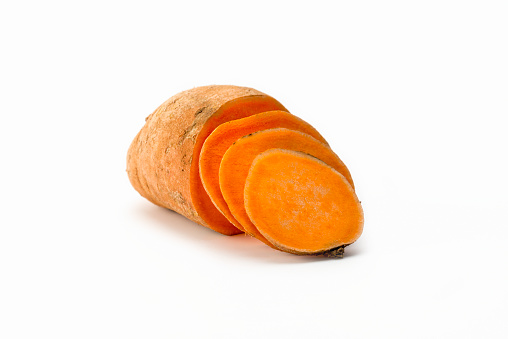 one sweet potato, half sliced up.