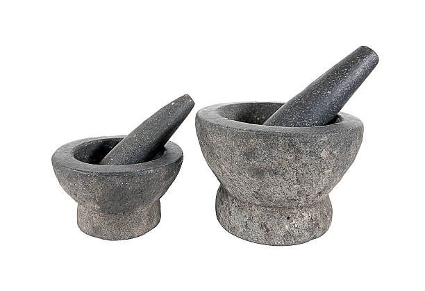 istock Stone mortar and pestle isolated on white background.Rock mortar 626624916