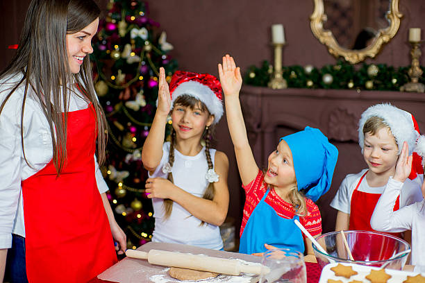 istock childrens baking christmas cookies 626629144