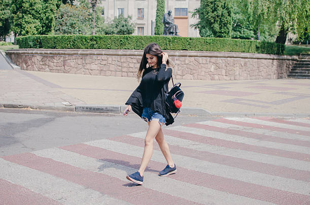 istock girl walking in the city 626629206