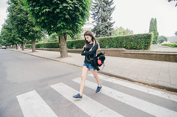 istock girl walking in the city 626629546