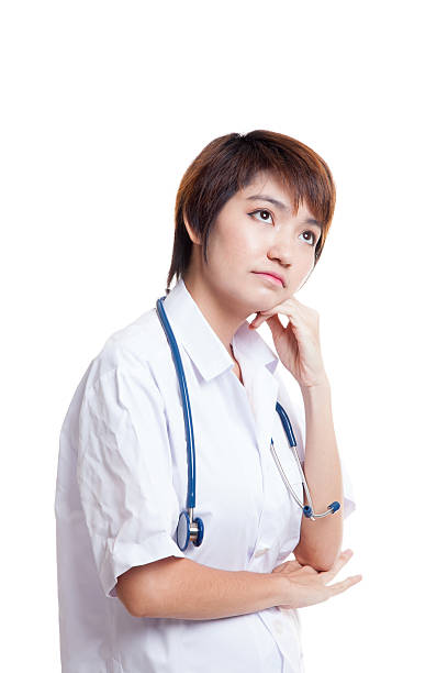istock Asian young female doctor thinking looking up. 626637868