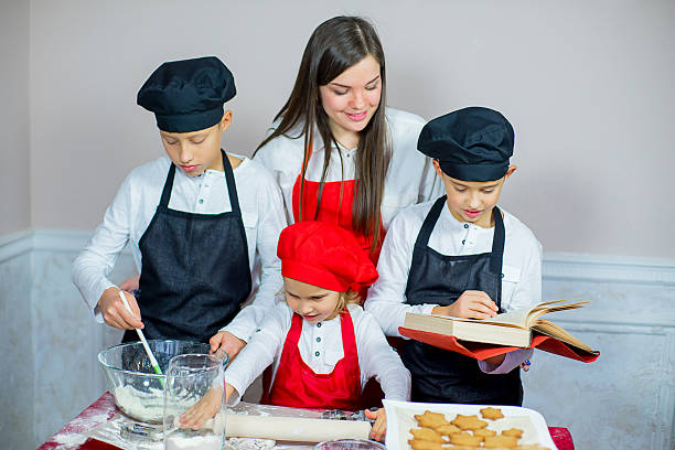 istock children baking christmas cookies 626638442