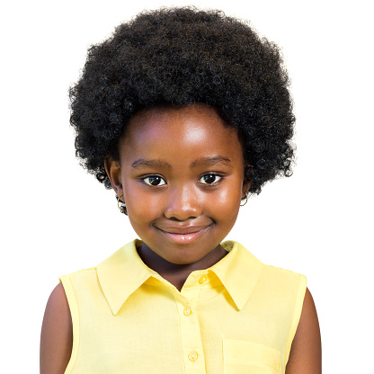 Close up portrait of little african girl with afro hairstyle isolated on white background.