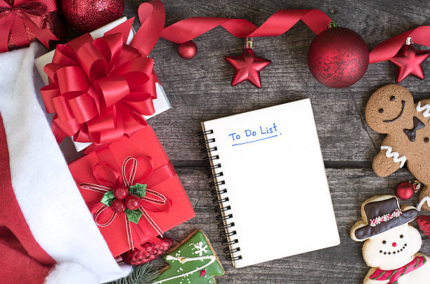 istock To do list in notebook with christmas background 626641380
