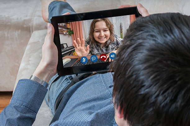 istock Young man is chatting with his girlfriend online. Videochat concept. 626641814