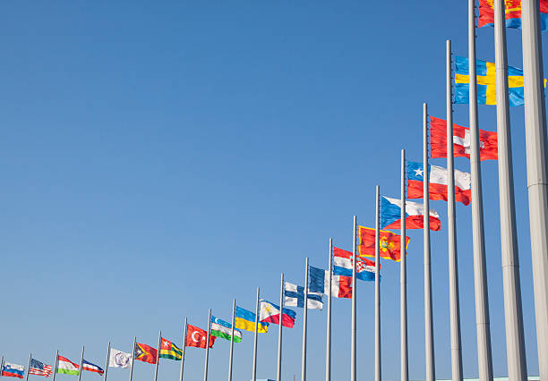 Flags of different countries on the flagpole Sochi, Russia - August 9, 2015. Olympic Park. Flags of different countries on the flagpole sochi photos stock pictures, royalty-free photos & images