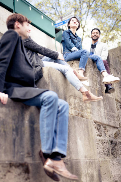 istock Multi-ethnic group of friends having fun in Paris along Seine 626648214