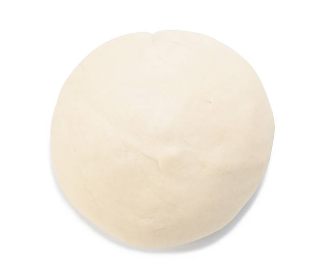 istock Ball of raw dough isolated on white background. Top view. 626656854