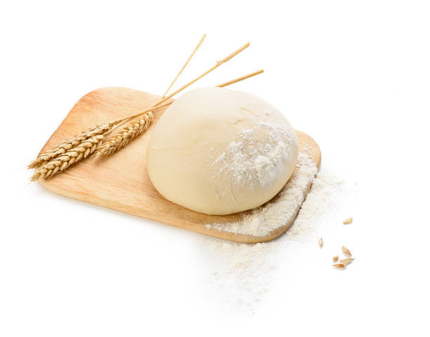istock Dough with ears of wheat isolated on white background. Top 626657354