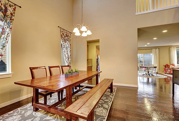 istock Dining area with rustic wooden table and bench 626658284