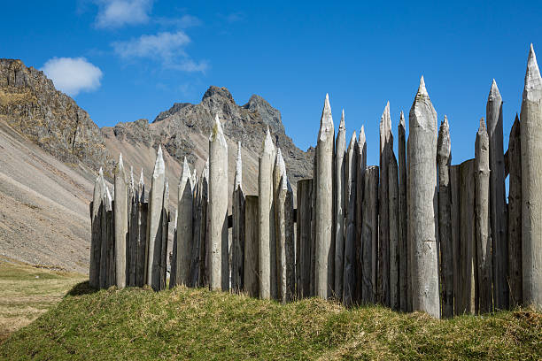 Viking Village Fence And Rocky Peaks Stock Photo - Download Image